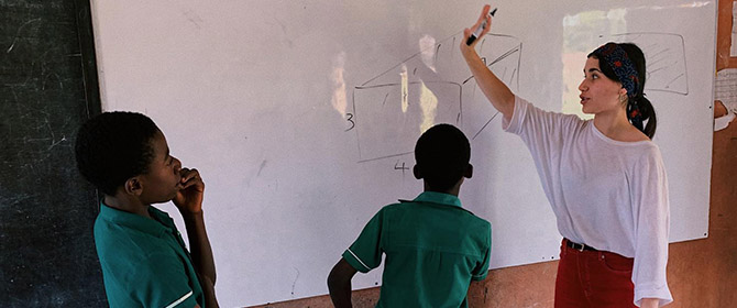 Warwick in Africa teacher and white board