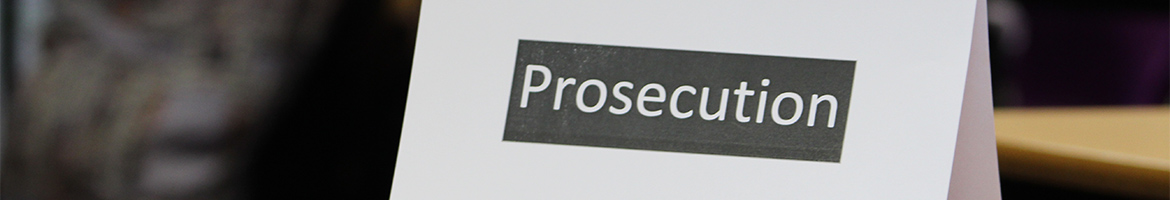 prosecution sign