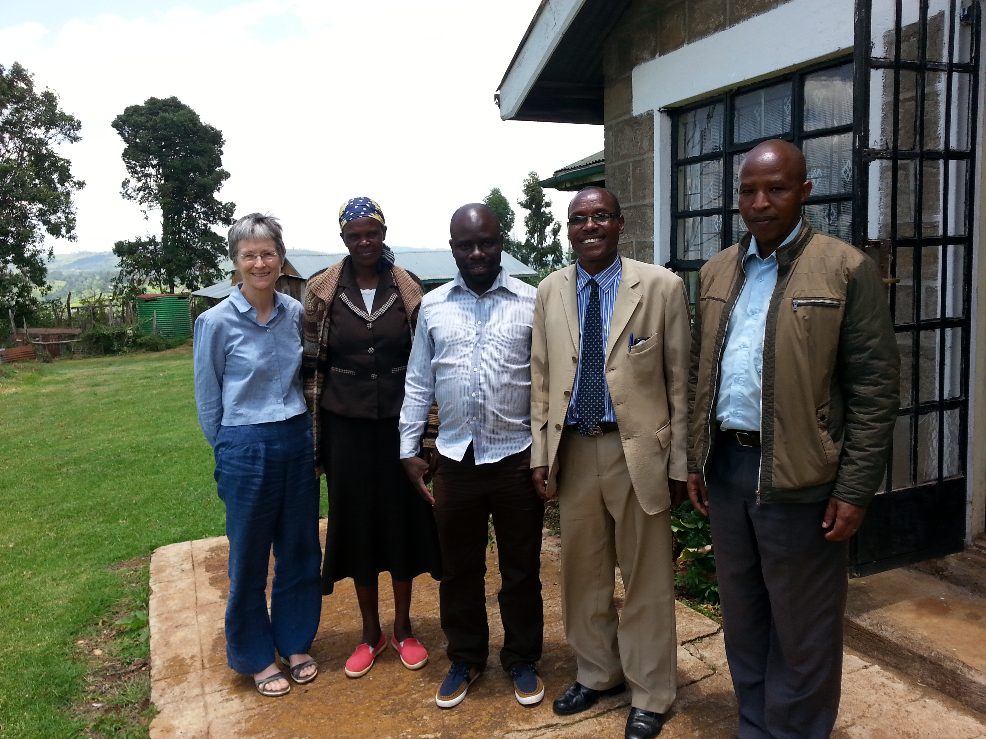 Ann Stewart (left) and David Ngira Otieno (centre) with the Kipsigi Community Chief and wife from a woman-to-woman marriage 