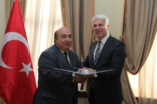 Professor  Ali Buyukuslu representing WMG and Yıldız Technical University with  Dr Kemal Yuksek of Turkish Airlines