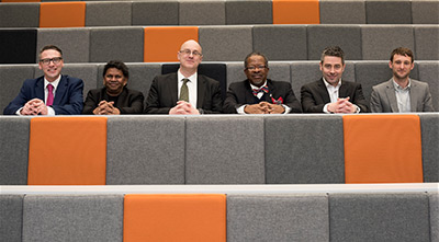 Photo of the event attendees sat in the OC0.03 lecture theatre